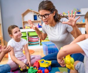 teacher playing with kids