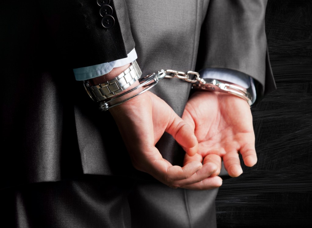 handcuffs on a man