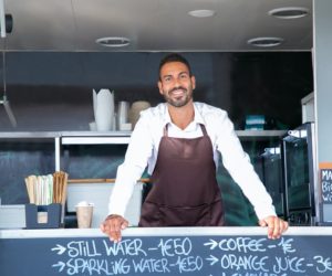 man in his food truck business