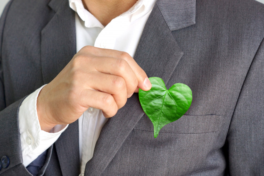 heart shaped leaf on businessman's pocket