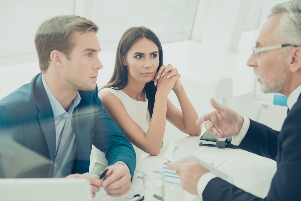 people consulting a lawyer