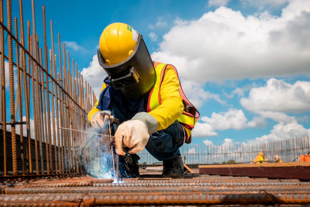 man welding