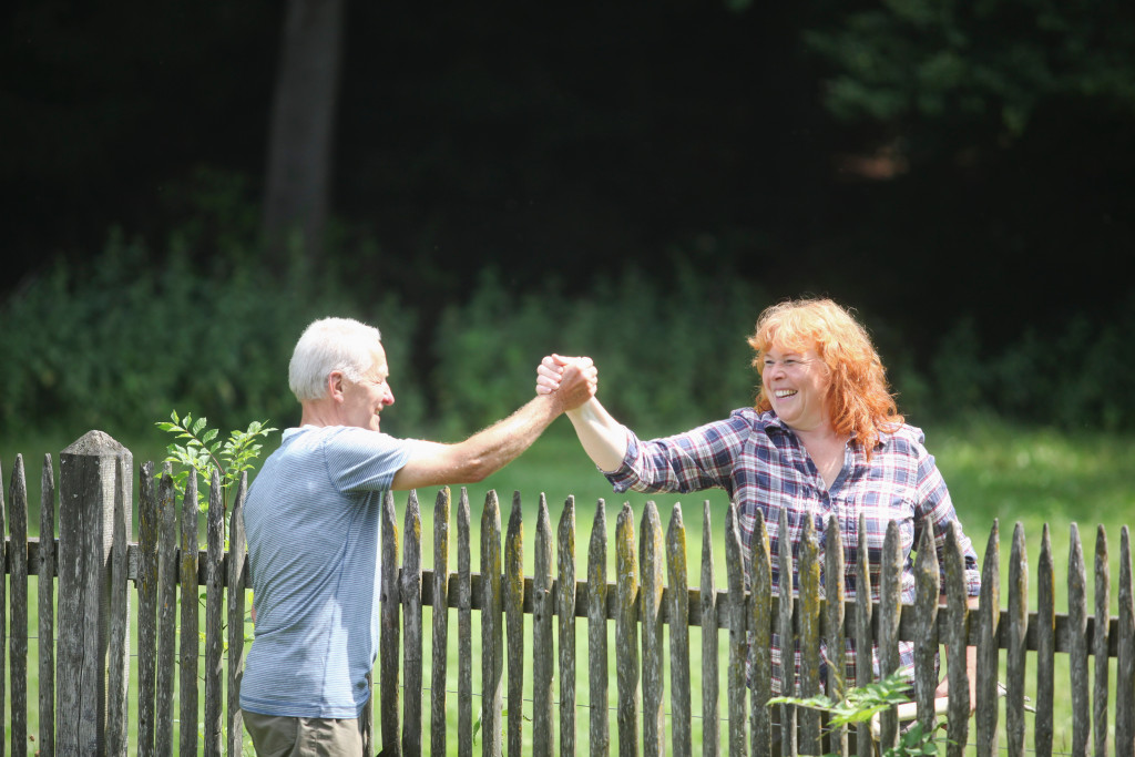 neighbors greeting each other