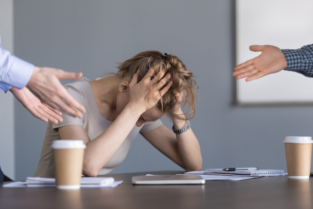 female employee stressed at work