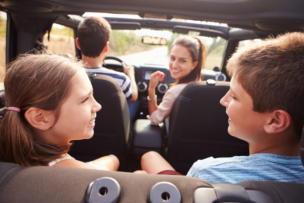 A happy family in a car