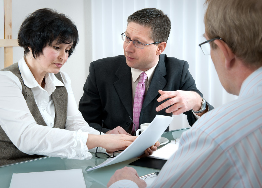 couple with a lawyer going through a divorce