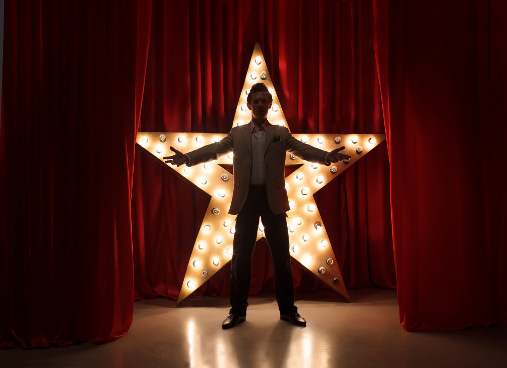 Silhouette of a man with a star as a background