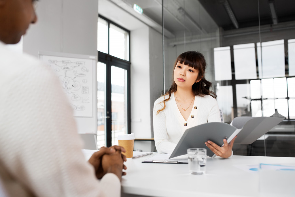 a female hr manager listening to an employee